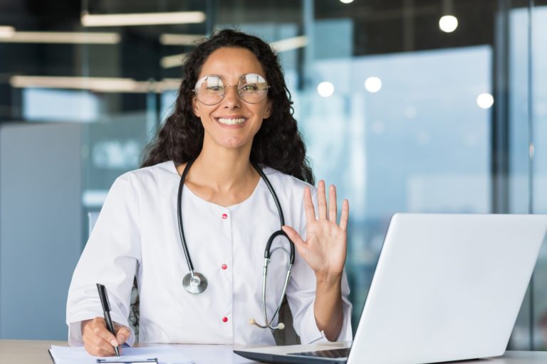 Portrait of a Latin American female pediatrician doctor. Conducts online consultations with patients